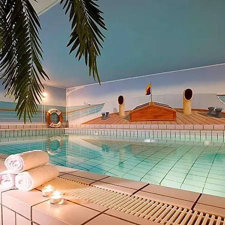 Village Hotel *